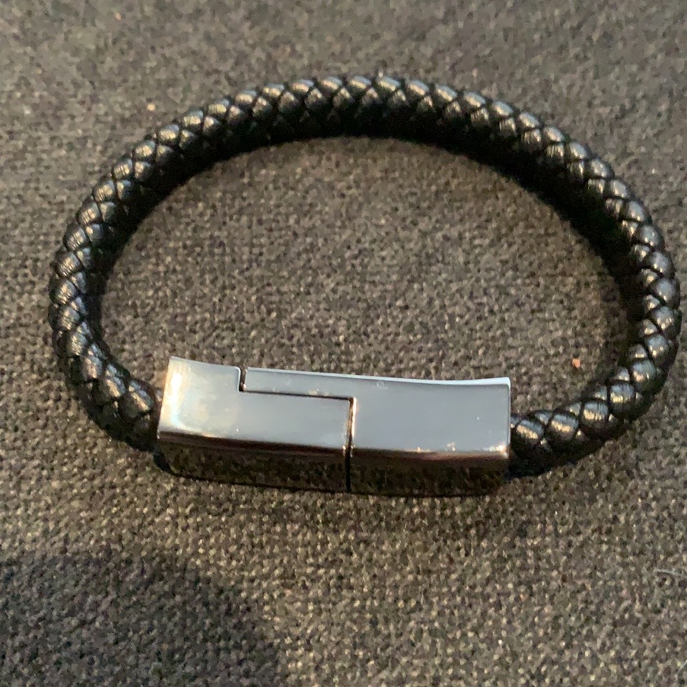 iPhone charging bracelet brand new never used or worn. Fits iPhone X and compat.